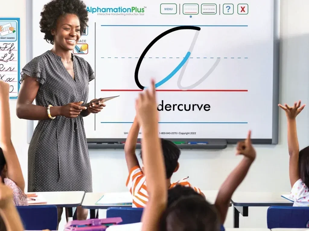 AlphamationPlus-Cursive-A-on-Whiteboard-in-Classroom-1-1-1-edited Home AlphamationPlus-Cursive-A-on-Whiteboard-in-Classroom-1-1-1-edited Home